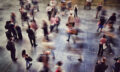 Blurred Motion Of People Walking At Railroad Station